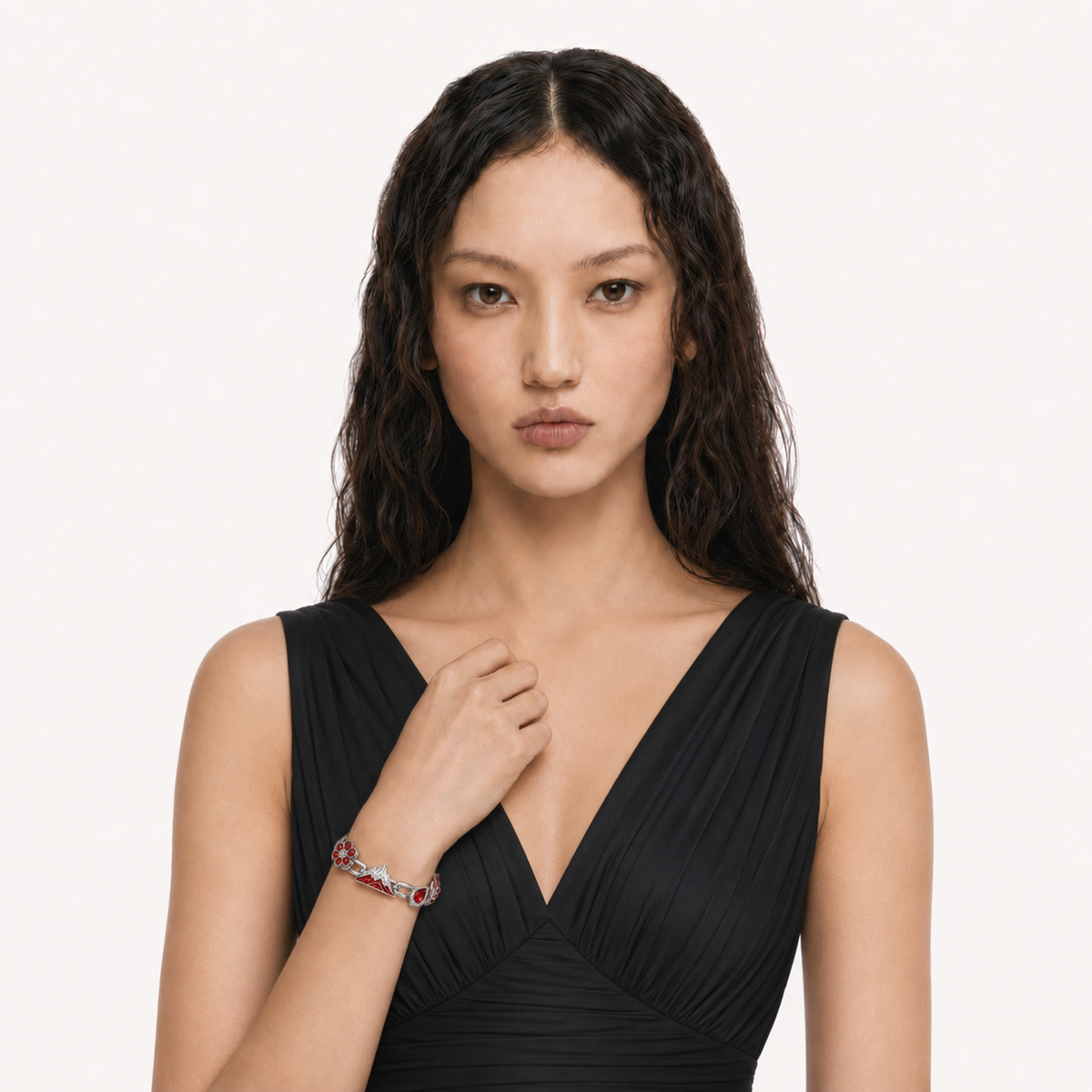 Model in a black dress wearing a pale blue Relic bracelet