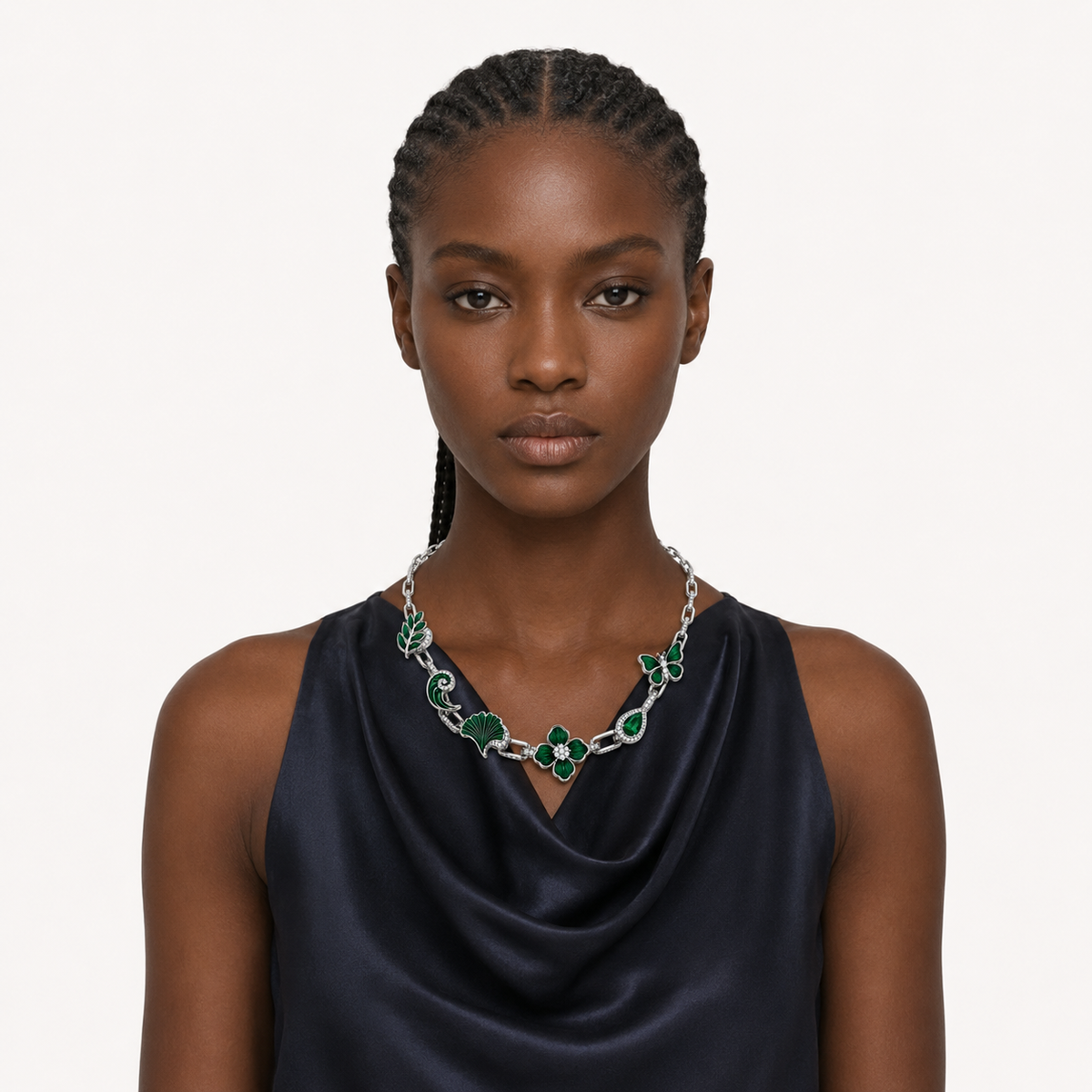 Close portrait of the Verdant Reliquary Necklace with a navy dress