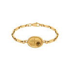 Gold Votive Seal Bracelet with engraved solar medallion and smoky stone